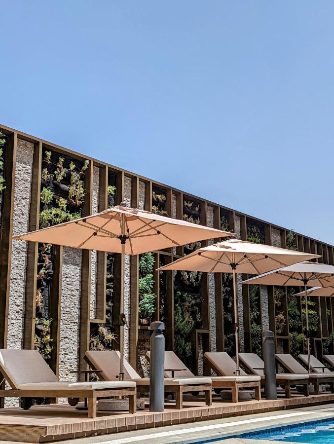 Citadines Abha Aparthotel Bagian luar foto The restaurant's patio