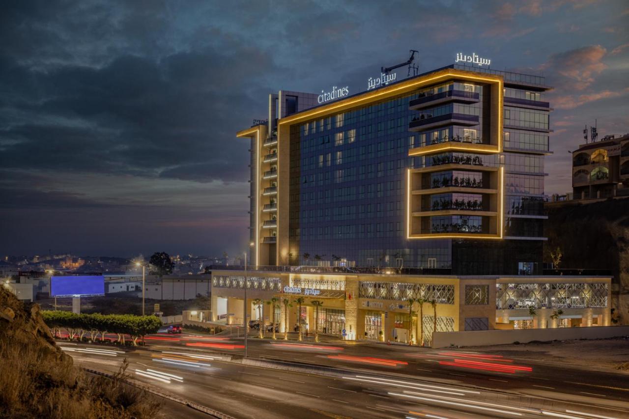 Citadines Abha Aparthotel Bagian luar foto The hotel at night
