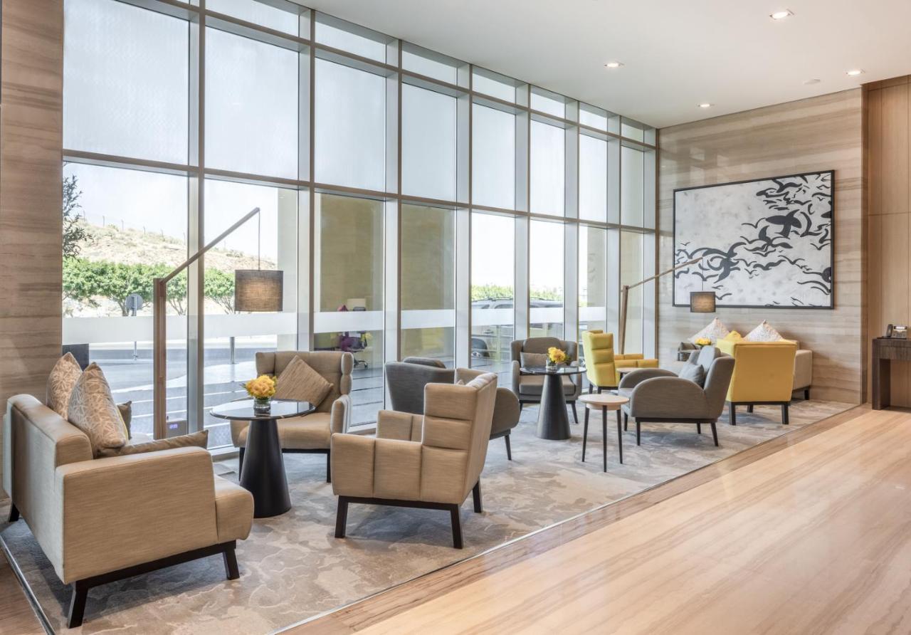 Citadines Abha Aparthotel Bagian luar foto The Lounge at the airport