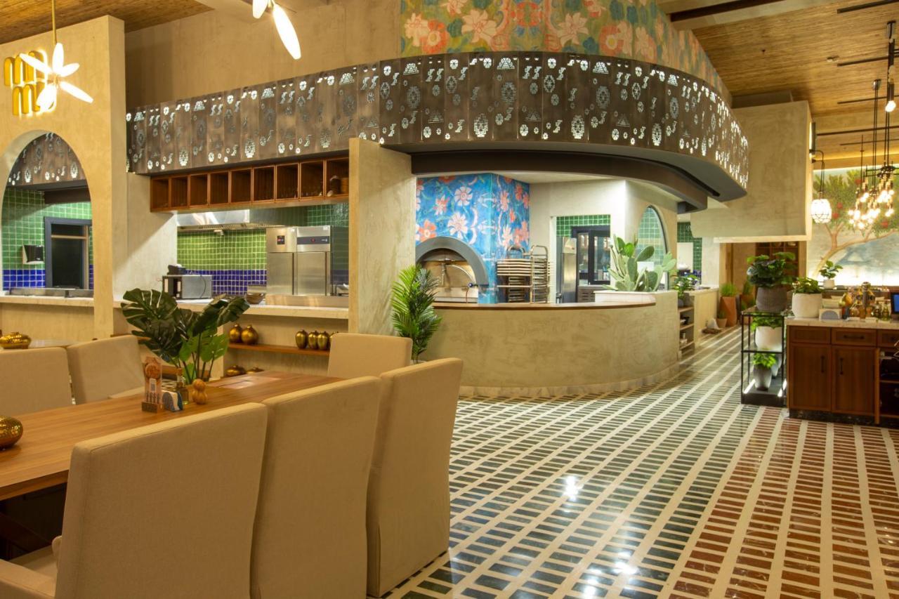 Citadines Abha Aparthotel Bagian luar foto The interior of the restaurant